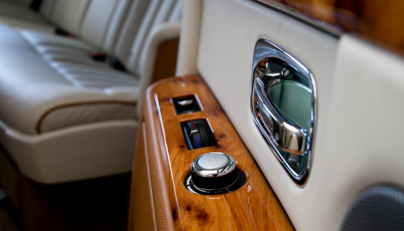 Luxurious limousine interior with leather seating and wood trim
